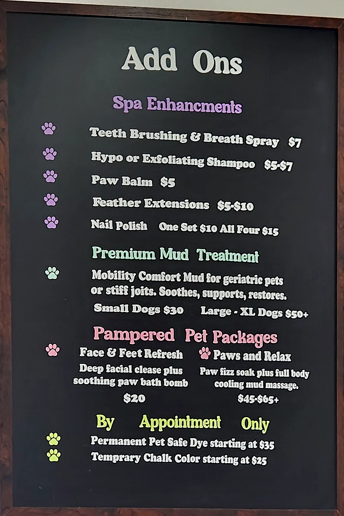 The Add Ons chalkboard on the wall at Zuzu's Pet Spa.
