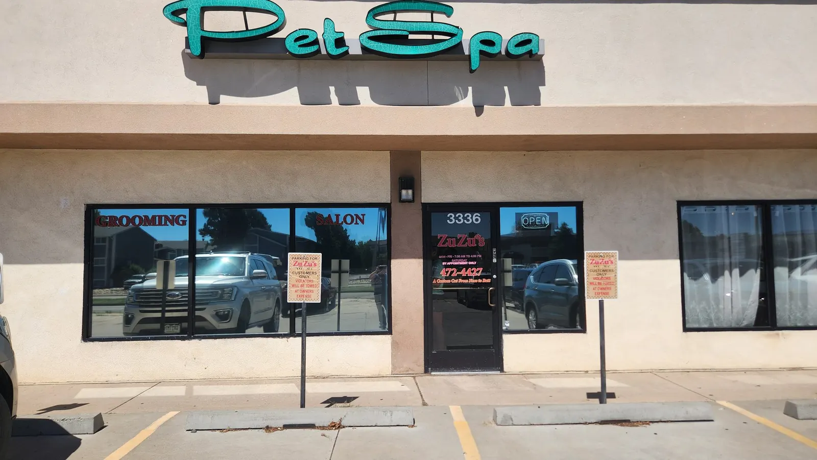 The Zuzu's Pet Spa storefront on Austin Bluffs Parkway in Colorado Springs.